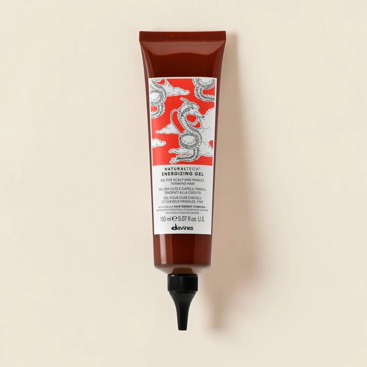 Tube de produit capillaire Davines sur un fond beige