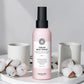 Spray thermoprotecteur Maria Nila Cream Heat Spray sur plateau blanc avec coton et tasses blanches, Victor Bazin Paris
