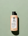 Maria Nila head & hair heal conditioner flacon sur un fond vert
